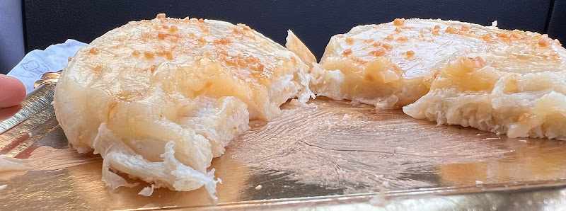 Fotografia tomada fuera de Panaderia Benavides, pan de tomas - Bakery en Barriada Primero de Mayo, Granada