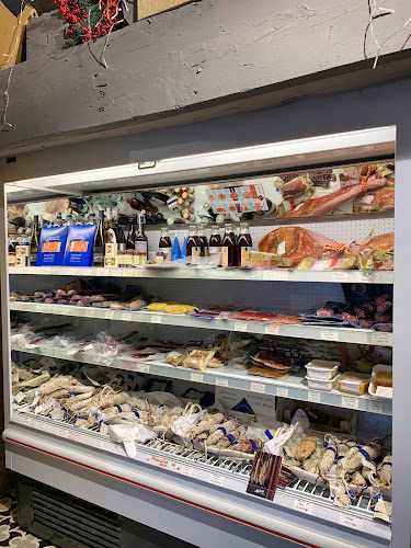 Fotografia tomada fuera de Chez Marzola - Tienda de delicatessen en Huesca, Huesca