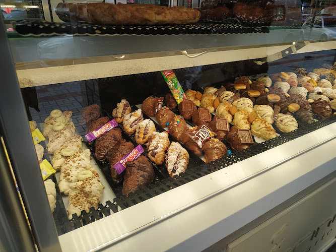 Fotografia tomada fuera de Panadería Harina y Arte - Panadería en Málaga, Málaga