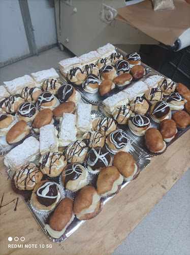 Fotografia tomada fuera de Panaderia Oviedo - Panadería en Dueñas, Palencia